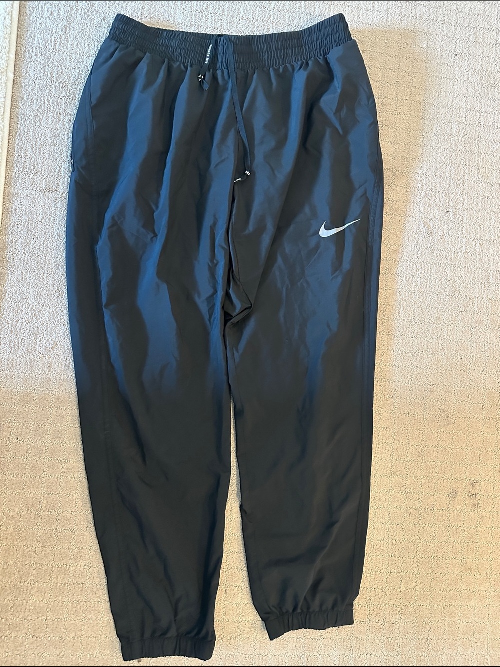 Nike Black womens Lightweight Jogger Pants with Silver Swoosh